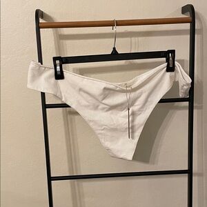 Skims raw edge thong